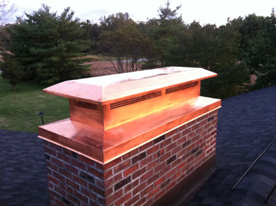 Before and after chimney cap replacement in Hicksville, NY