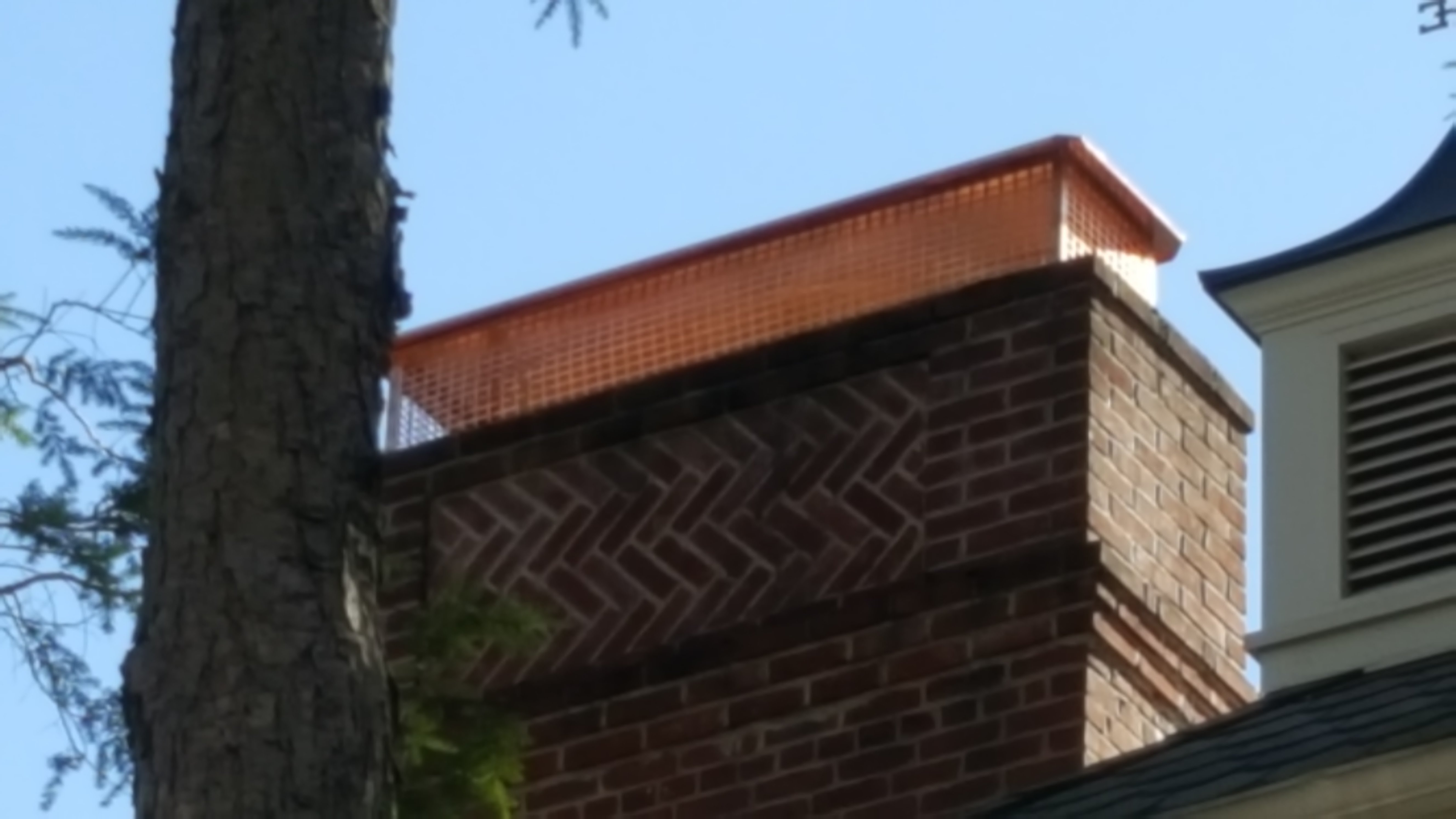 New stainless steel chimney cap installed in Hicksville, NY