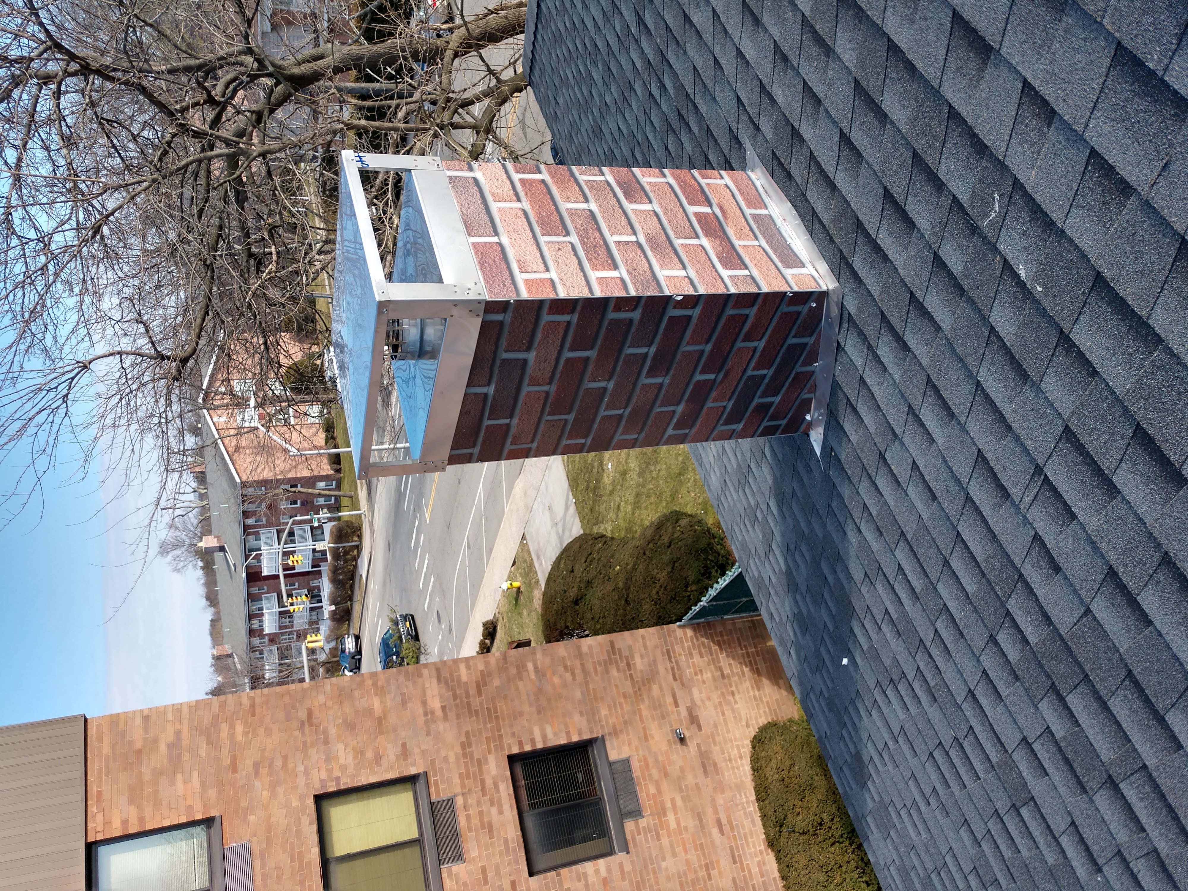 New elastomeric sealant applied to chimney crown in Hicksville, NY