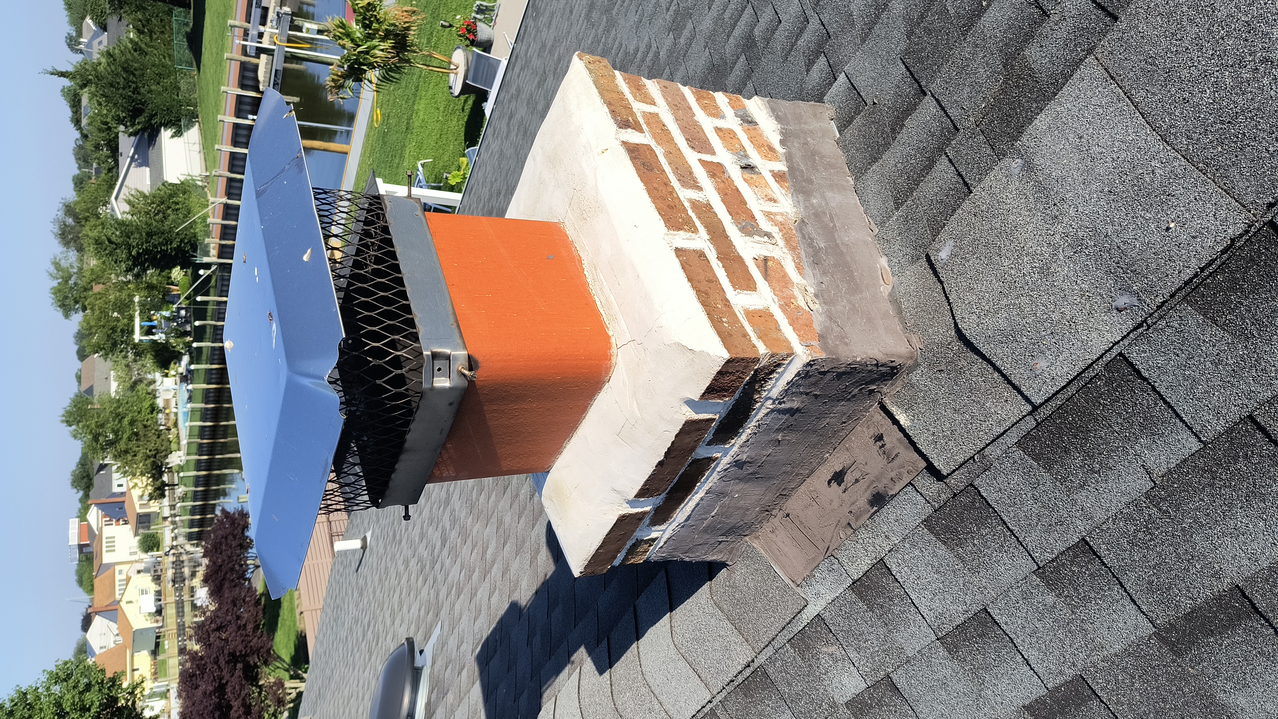 Full chimney masonry rebuild and restoration in Hicksville, NY