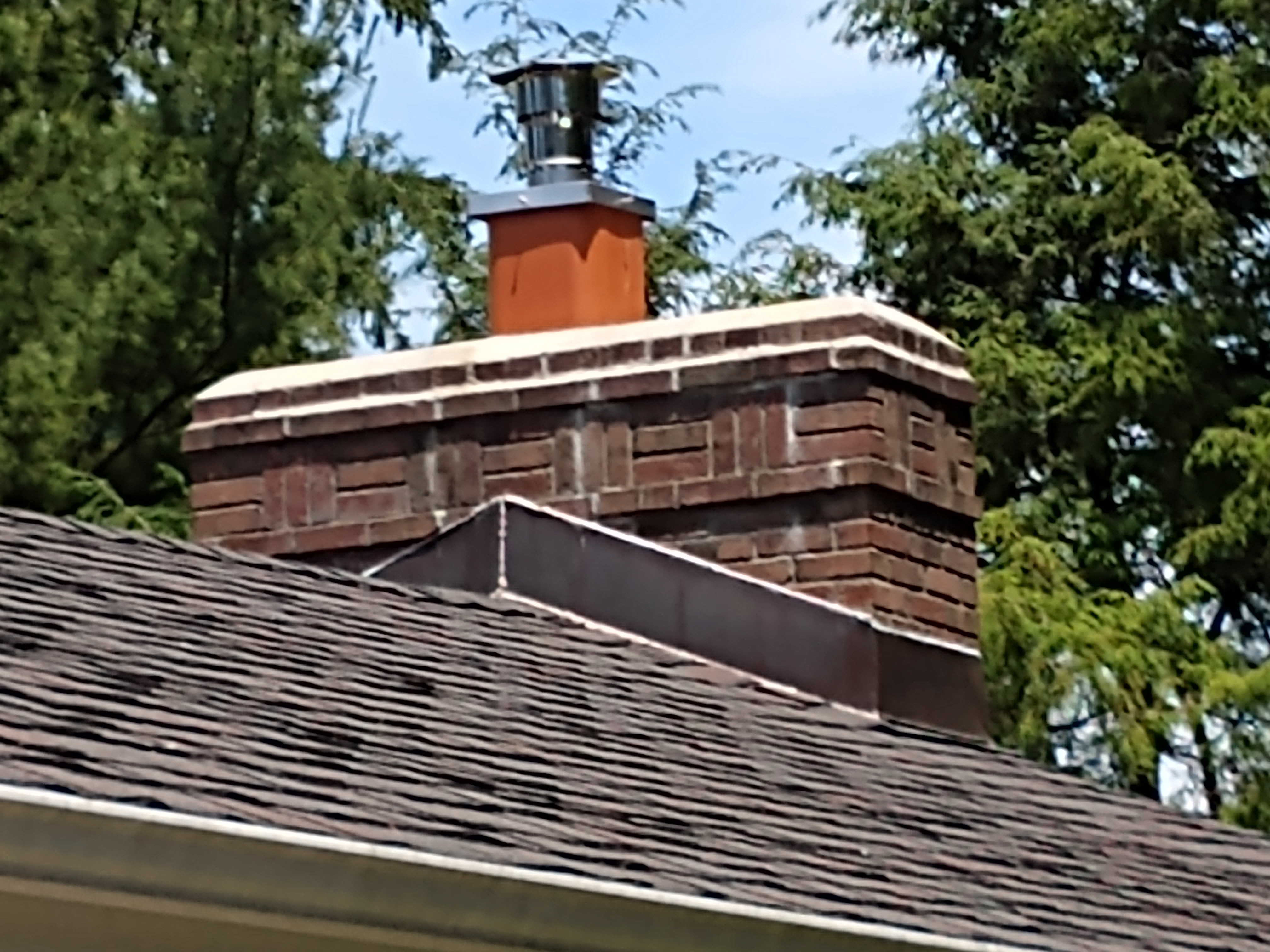 Stainless steel chimney cap with animal guard in Hicksville, New York